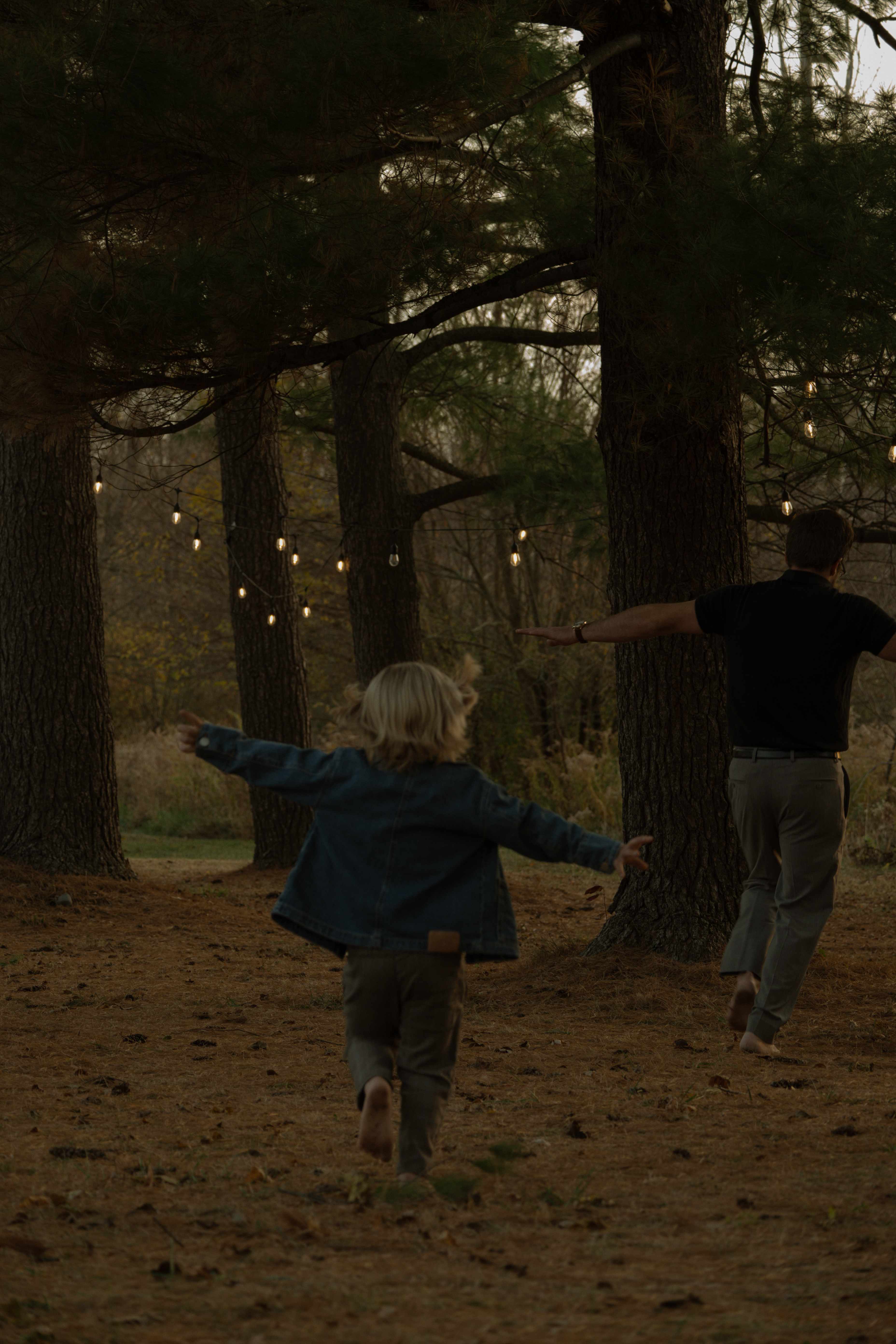 Grant family children playing with string lights